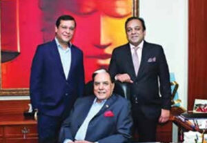 Subhash Chandra with his younger son Amit Goenka (L) and his elder son Punit Goenka (R)